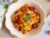 Ricotta and spinach ravioli with 3-tomato sauce