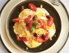 Girasoli cacio e pepe with walnut cream, confit cherry tomatoes and taggiasche olives